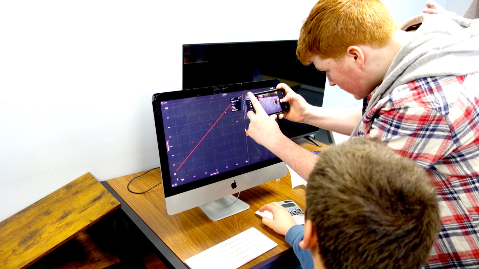 A student working through a problem on screen